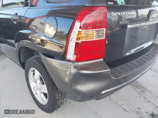 2007 Kia Sportage LX with VIN KNDJF724877450962, listed as a IAAI auction lot 41918290 with 216,476 mi miles. Bid and sale history available at carsss.com. Image 6.