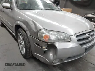 2002 Nissan Maxima GLE with VIN JN1DA31D32T422365, listed as a IAAI auction lot 41644137 with 165,157 mi miles and . Bid and sale history available at DreamBid. Image 6.