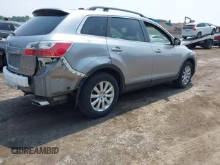2010 Mazda CX-9 Touring with VIN JM3TB3MV0A0237658, listed as a IAAI auction lot 42460522 with 175,529 mi miles and . Bid and sale history available at DreamBid. Image 4.