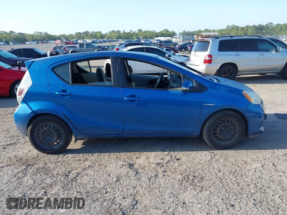 2012 Toyota Prius c One with VIN JTDKDTB34C1026833, listed as a IAAI auction lot 42001552 with 224,426 mi miles. Bid and sale history available at carsss.com. Image 13.