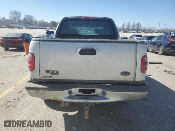 2003 Ford F-150 XLT with VIN 1FTRW08L03KD74119, listed as a Copart auction lot 47373105 with 303,513 mi miles and Salvage Title. Bid and sale history available at carsss.com. Image 6.