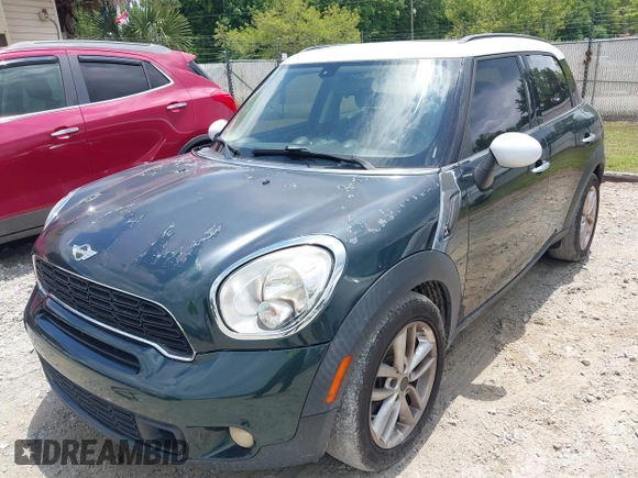 2013 MINI Countryman S z VIN WMWZC3C52DWP20729, wystawiony jako IAAI lot #42388184 z przebiegiem 165 283 mil mil oraz . Historia ofert i sprzedaży dostępna na DreamBid. Obrazek 6.