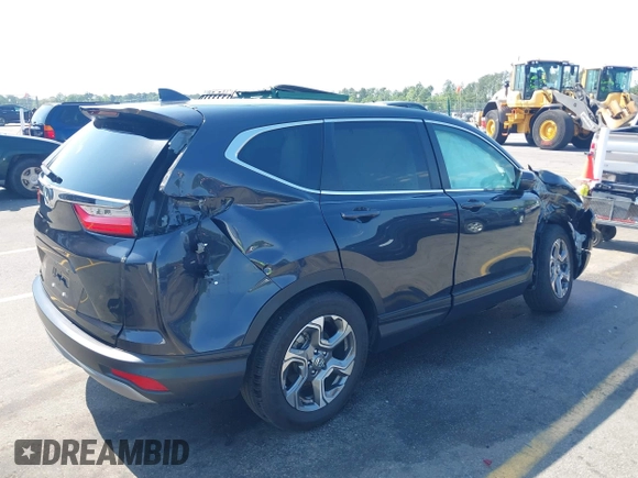 2019 Honda CR-V EX with VIN 2HKRW1H52KH513252, listed as a IAAI auction lot 42074091 with 31,764 mi miles and . Bid and sale history available at DreamBid. Image 4.