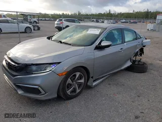2019 Honda Civic Sedan LX with VIN 2HGFC2F62KH583213, listed as a IAAI auction lot 41935570 with 143,992 mi miles. Bid and sale history available at carsss.com. Image 18.