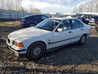 1995 BMW 3 Series 325i with VIN WBACB4326SFM22346, listed as a Copart auction lot 79960304 with 71,071 mi miles and Salvage Title. Bid and sale history available at carsss.com. Image 1.