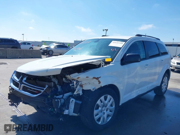2019 Dodge Journey SE Value with VIN 3C4PDCAB1KT868065, listed as a IAAI auction lot 41642318 with 97,735 mi miles and . Bid and sale history available at DreamBid. Image 20.