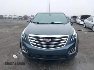 2019 Cadillac XT5 FWD with VIN 1GYKNARS5KZ220134, listed as a IAAI auction lot 41472927 with 58,229 mi miles and . Bid and sale history available at DreamBid. Image 12.