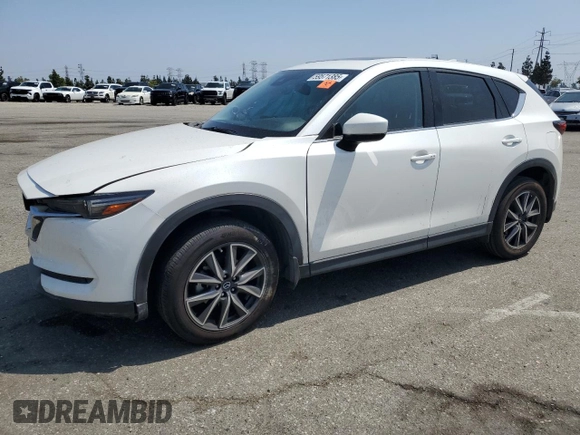 2018 Mazda CX-5 Grand Touring z VIN JM3KFADM3J1464073, wystawiony jako Copart lot #59571385 z przebiegiem Nie podano mil oraz Szkoda całkowita • Salvage title. Historia ofert i sprzedaży dostępna na DreamBid. Obrazek 1.