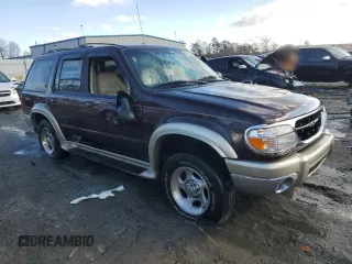 2000 Ford Explorer Eddie Bauer z VIN 1FMZU74E6YUB37521, wystawiony jako Copart lot #85994294 z przebiegiem 126 348 mil mil oraz Szkoda całkowita • Salvage title. Historia ofert i sprzedaży dostępna na DreamBid. Obrazek 4.