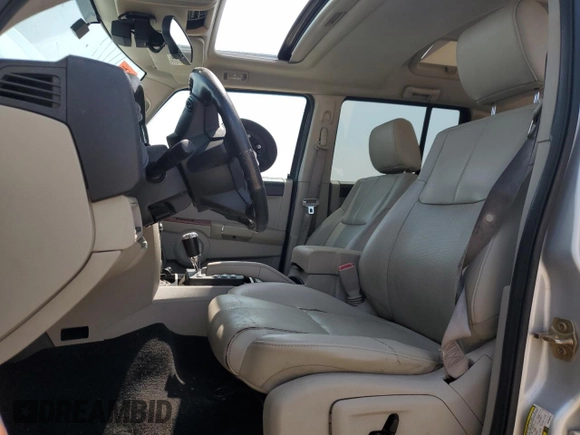 2006 Jeep Commander Limited with VIN 1J8HH58256C366079, listed as a Copart auction lot 51107395 with 176,738 mi miles and Salvage title. Bid and sale history available at DreamBid. Image 7.