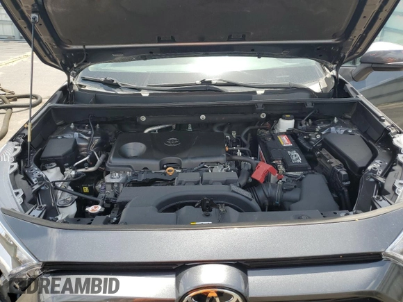 2020 Toyota RAV4 XLE with VIN 2T3W1RFV1LC034366, listed as a Copart auction lot 61774875 with 77,335 mi miles and Salvage title. Bid and sale history available at DreamBid. Image 12.