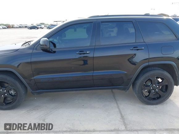2018 Jeep Grand Cherokee Altitude with VIN 1C4RJFAG9JC436848, listed as a IAAI auction lot 42303459 with 124,044 mi miles and . Bid and sale history available at DreamBid. Image 14.