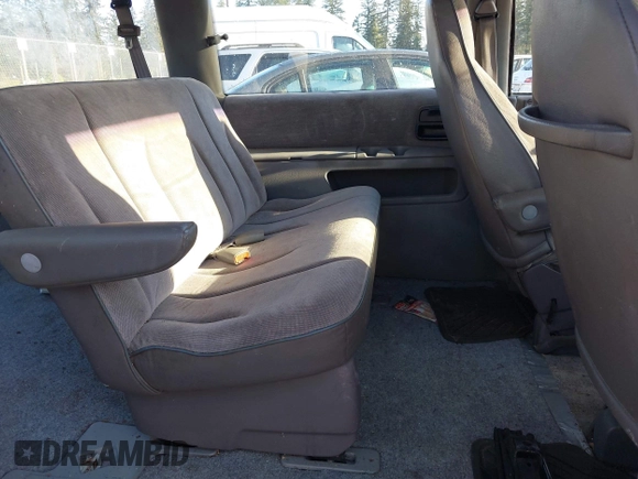 1993 Dodge Grand Caravan with VIN 1B4GK44R4PX675504, listed as a IAAI auction lot 42010737 with 219,886 mi miles and . Bid and sale history available at DreamBid. Image 8.