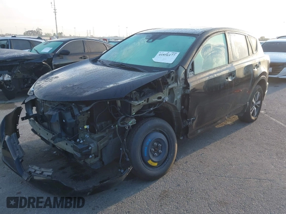 2018 Toyota RAV4 XLE with VIN 2T3WFREV2JW483635, listed as a IAAI auction lot 41856177 with 94,710 mi miles. Bid and sale history available at carsss.com. Image 2.