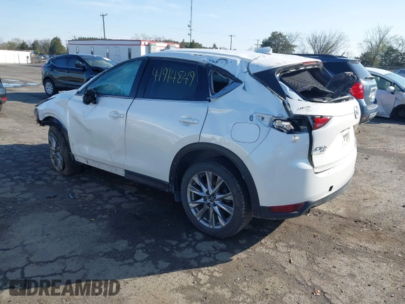 2020 Mazda CX-5 Grand Touring with VIN JM3KFBDM6L0751471, listed as a IAAI auction lot 41914849 with Not Provided miles and . Bid and sale history available at carsss.com. Image 3.