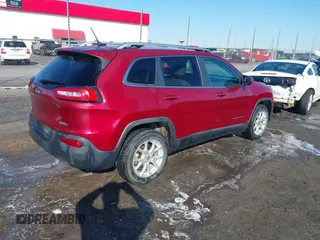 2015 Jeep Cherokee Latitude with VIN 1C4PJLCB4FW730607, listed as a IAAI auction lot 41738845 with 202,216 mi miles and . Bid and sale history available at DreamBid. Image 4.