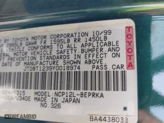 2000 Toyota ECHO with VIN JTDBT1239Y0018974, listed as a IAAI auction lot 42080620 with 171,388 mi miles. Bid and sale history available at carsss.com. Image 9.