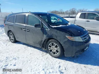 2011 Honda Odyssey EX with VIN 5FNRL5H41BB033760, listed as a IAAI auction lot 41583279 with 187,260 mi miles. Bid and sale history available at carsss.com. Image 1.