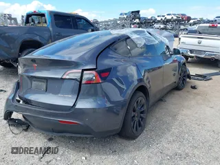 2022 Tesla Model Y Long Range z VIN 7SAYGDEE8NF443194, wystawiony jako IAAI lot #42259205 z przebiegiem 38 540 mil mil oraz . Historia ofert i sprzedaży dostępna na DreamBid. Obrazek 4.