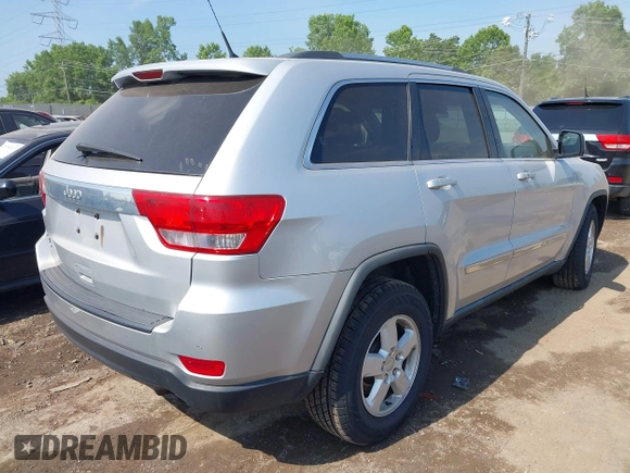 2011 Jeep Grand Cherokee Laredo with VIN 1J4RR4GG0BC515356, listed as a IAAI auction lot 42581314 with 193,226 mi miles and . Bid and sale history available at DreamBid. Image 4.