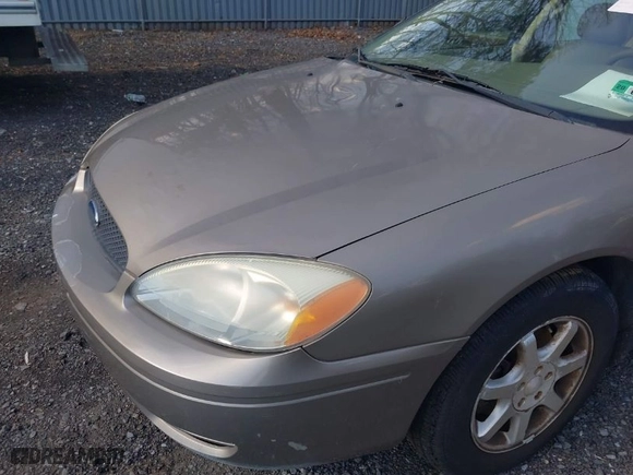 2007 Ford Taurus SEL with VIN 1FAFP56U87A153488, listed as a IAAI auction lot 41874575 with 182,451 mi miles. Bid and sale history available at carsss.com. Image 6.