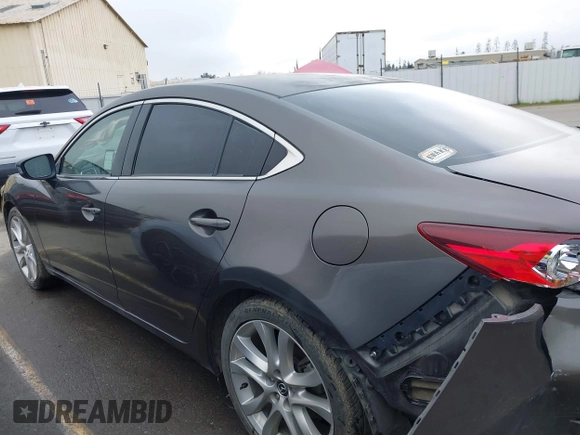 2016 Mazda 6 i Touring with VIN JM1GJ1V52G1473330, listed as a IAAI auction lot 41657684 with 138,064 mi miles and . Bid and sale history available at DreamBid. Image 14.