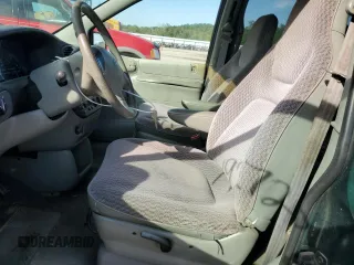 1998 Dodge Caravan with VIN 2B4FP25B1WR827822, listed as a Copart auction lot 70676574 with 192,726 mi miles and Salvage Title. Bid and sale history available at carsss.com. Image 7.