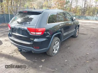 2013 Jeep Grand Cherokee Limited with VIN 1C4RJEBG6DC656719, listed as a IAAI auction lot 40897970 with 133,947 mi miles. Bid and sale history available at carsss.com. Image 4.