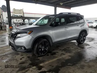 2019 Honda Passport Elite with VIN 5FNYF8H02KB007217, listed as a Copart auction lot 48919895 with 53,811 mi miles and Salvage Title. Bid and sale history available at carsss.com. Image 1.