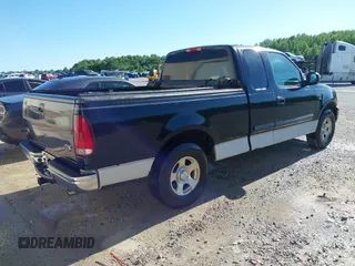 2001 Ford F-150 XL z VIN 1FTRX17WX1NB86721, wystawiony jako IAAI lot #42319610 z przebiegiem 254 826 mil mil oraz . Historia ofert i sprzedaży dostępna na DreamBid. Obrazek 4.