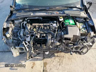 2018 Ford Focus SE z VIN 1FADP3F2XJL256272, wystawiony jako Copart lot #52651675 z przebiegiem 37 897 mil mil oraz Szkody całkowita. Historia ofert i sprzedaży dostępna na DreamBid. Obrazek 11.