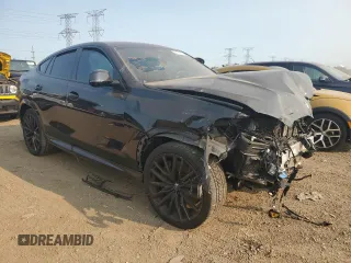 2021 BMW X6 M50i with VIN 5UXCY8C05M9H31042, listed as a Copart auction lot 64614714 with 0 mi miles and Salvage Title. Bid and sale history available at carsss.com. Image 4.