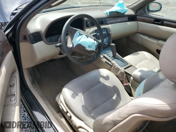 1997 Lexus SC 400 z VIN JT8CH32Y6V1000062, wystawiony jako Copart lot #51287595 z przebiegiem 243 624 mil mil oraz Szkody całkowita. Historia ofert i sprzedaży dostępna na DreamBid. Obrazek 8.