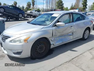 2013 Nissan Altima SV with VIN 1N4AL3AP4DN517857, listed as a IAAI auction lot 42020248 with 234,536 mi miles and . Bid and sale history available at carsss.com. Image 2.