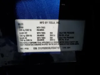 2020 Tesla Model Y Long Range with VIN 5YJYGDEE8LF034719, listed as a Copart auction lot 50888365 with 55,307 mi miles and Salvage Title. Bid and sale history available at DreamBid. Image 14.