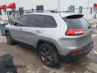 2016 Jeep Cherokee Latitude with VIN 1C4PJLCB5GW369955, listed as a IAAI auction lot 41297796 with 99,029 mi miles. Bid and sale history available at carsss.com. Image 3.