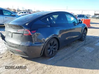 2024 Tesla Model Y Long Range with VIN 7SAYGAEE5RF201368, listed as a IAAI auction lot 41248963 with Not Provided miles and . Bid and sale history available at DreamBid. Image 4.