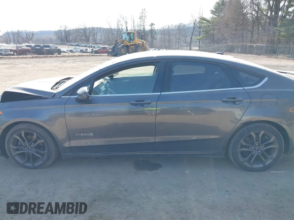 2018 Ford Fusion SE z VIN 3FA6P0LU6JR118226, wystawiony jako IAAI lot #41811406 z przebiegiem 165 352 mil mil oraz . Historia ofert i sprzedaży dostępna na DreamBid. Obrazek 15.