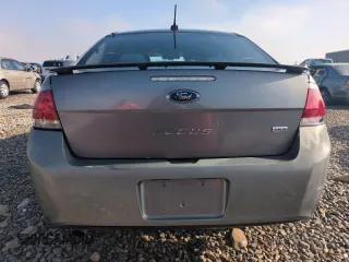 2011 Ford Focus SES with VIN 1FAHP3GNXBW108570, listed as a Copart auction lot 81977954 with 147,563 mi miles and Salvage Title. Bid and sale history available at carsss.com. Image 6.