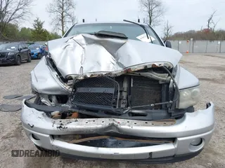 2004 Dodge 1500 SLT with VIN 1D7HU18D14J216675, listed as a IAAI auction lot 41967225 with 237,692 mi miles. Bid and sale history available at carsss.com. Image 12.