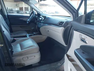 2020 Honda Pilot EX-L with VIN 5FNYF5H50LB011021, listed as a IAAI auction lot 41382249 with 113,884 mi miles. Bid and sale history available at carsss.com. Image 5.