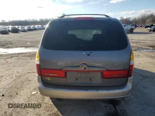 2000 Mercury Villager z VIN 4M2XV14T0YDJ07610, wystawiony jako Copart lot #79814194 z przebiegiem 132 833 mil mil oraz Szkody całkowita. Historia ofert i sprzedaży dostępna na DreamBid. Obrazek 6.