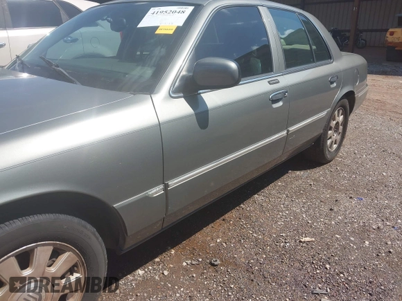 2003 Mercury Grand Marquis LS Premium z VIN 2MEFM75W53X691700, wystawiony jako IAAI lot #41952048 z przebiegiem 208 747 mil mil oraz . Historia ofert i sprzedaży dostępna na DreamBid. Obrazek 6.
