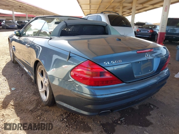 2005 Mercedes-Benz SL 500 with VIN WDBSK75F95F106944, listed as a IAAI auction lot 41970698 with 123,881 mi miles and . Bid and sale history available at DreamBid. Image 3.
