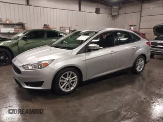 2015 Ford Focus SE with VIN 1FADP3F28FL357382, listed as a IAAI auction lot 41223441 with 47,682 mi miles. Bid and sale history available at carsss.com. Image 2.