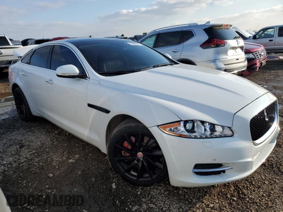 2013 Jaguar XJ with VIN SAJWJ1CD6D8V50968, listed as a Copart auction lot 79880924 with 136,280 mi miles and Salvage Title. Bid and sale history available at carsss.com. Image 4.