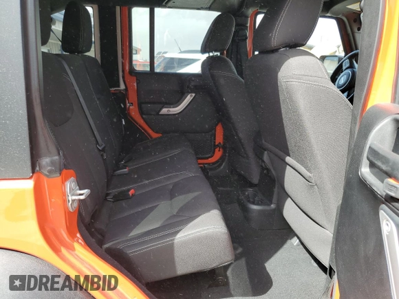 2015 Jeep Wrangler Unlimited Rubicon with VIN 1C4BJWFG9FL654550, listed as a Copart auction lot 49306965 with 64,911 mi miles and Salvage Title. Bid and sale history available at carsss.com. Image 10.