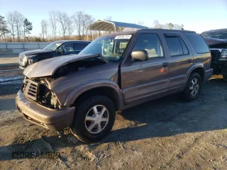 1999 Oldsmobile Bravada z VIN 1GHDT13W1X2707678, wystawiony jako Copart lot #88686715 z przebiegiem 175 842 mil mil oraz Szkody całkowita. Historia ofert i sprzedaży dostępna na DreamBid. Obrazek 1.