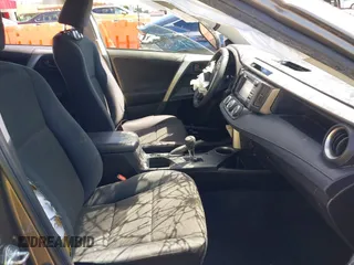 2015 Toyota RAV4 LE with VIN JTMBFREV2FD124756, listed as a IAAI auction lot 42051691 with 92,699 mi miles and . Bid and sale history available at DreamBid. Image 5.