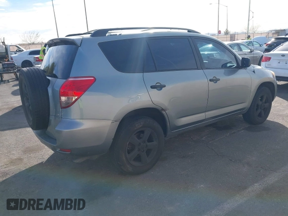 2008 Toyota RAV4 with VIN JTMBK33V886036474, listed as a IAAI auction lot 41615693 with 214,589 mi miles. Bid and sale history available at carsss.com. Image 4.